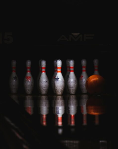 clear glass bottles on black table