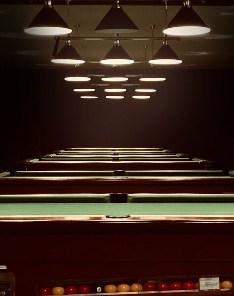 red and black train in a tunnel