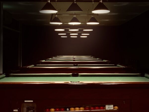 red and black train in a tunnel