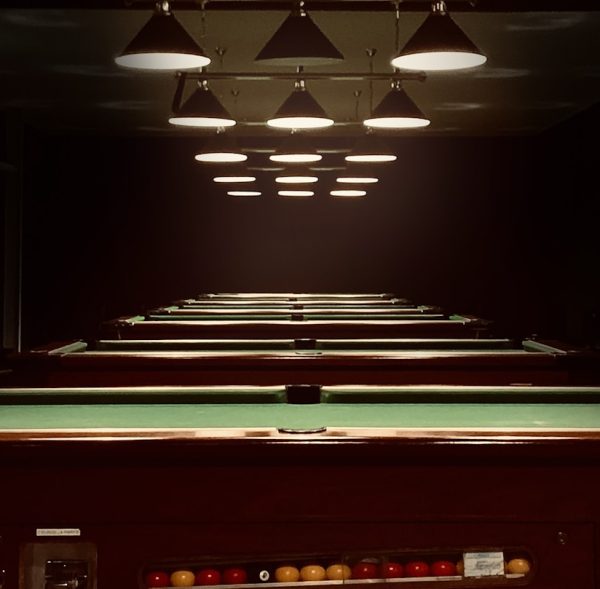 red and black train in a tunnel